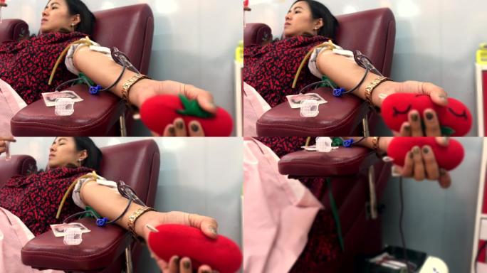 女性献血特写镜头爱心公益抽血
