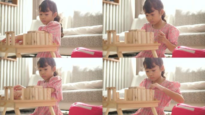 小女孩玩木箱积木小孩玩积木儿童玩家