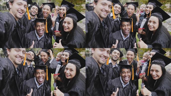 毕业典礼后，一群大学生朋友合影自拍
