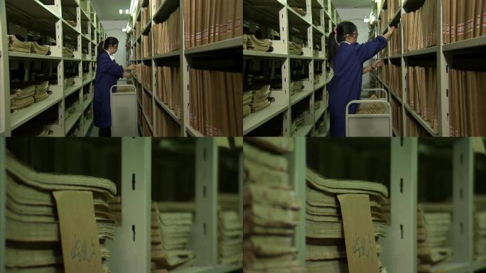 档案馆档案室工作人员归类寻找翻阅