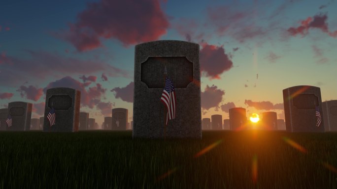 日落时分，美国国旗插在美国国家公墓的坟墓前