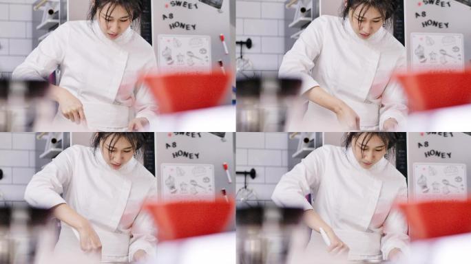 年轻女性烘培师在厨房做准备
