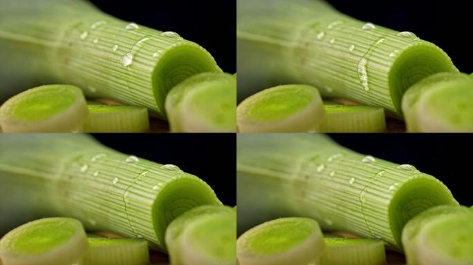 缓慢的水滴滑落在切好的韭菜上