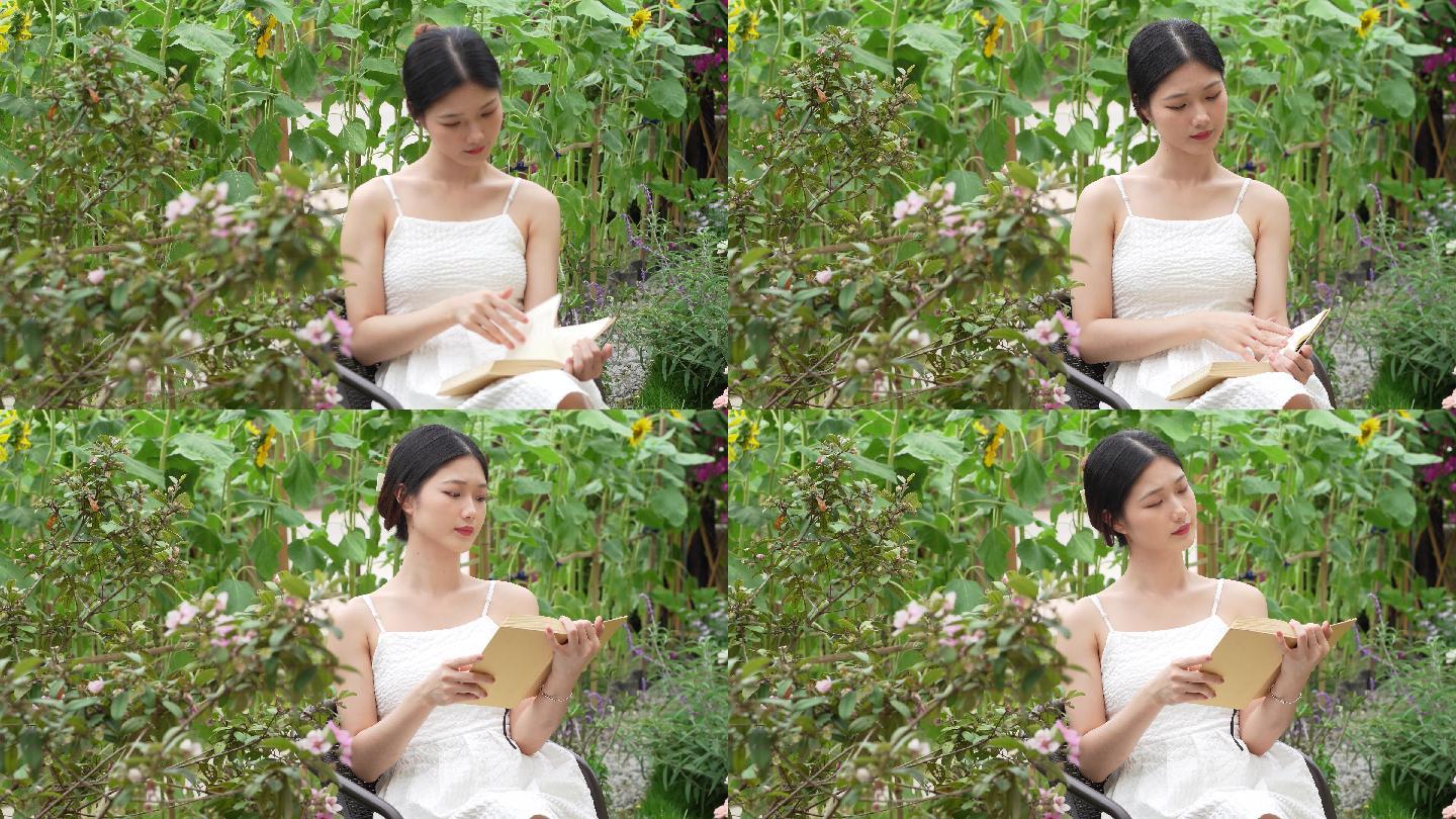 女孩在花园里看书