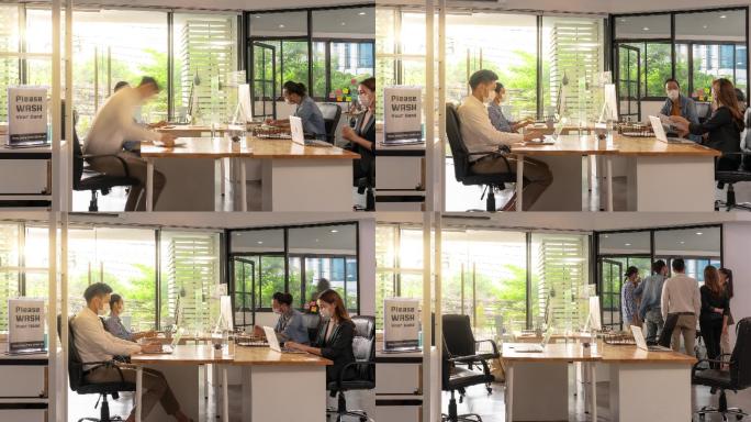 4K UHD缩小延时：办公室员工跨种族团队使用社交距离表在新的普通办公室开始工作。所有员工都戴上防护