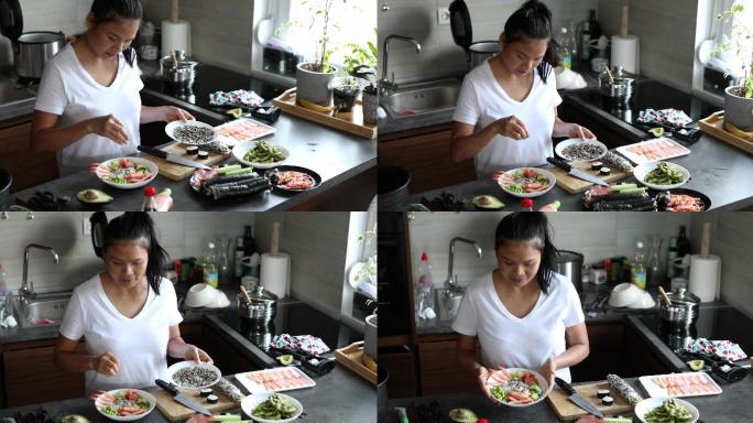 专业寿司厨师，用黑白芝麻调味，配海鲜和生蔬菜