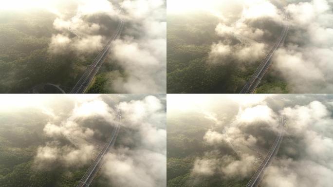 航拍云雾下的山区高速路