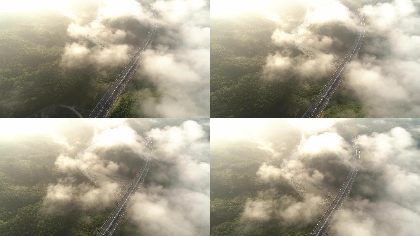 航拍云雾下的山区高速路
