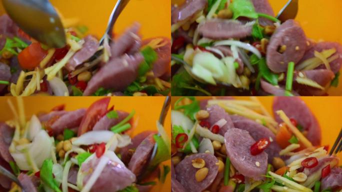 慢镜头特写制作辛辣泰国食物，百胜酸味猪肉。