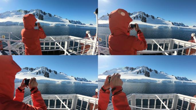 女性在南极船上拍照