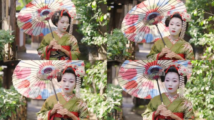 Maiko（艺妓在训练）在京都Gion的狭窄人行道上行走