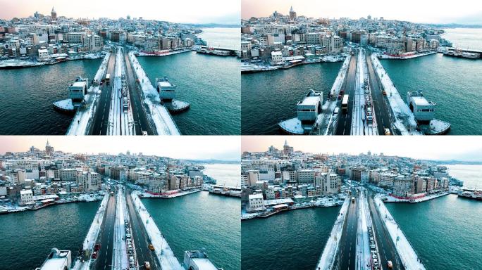 伊斯坦布尔-加拉塔大桥和卡拉科伊白雪皑皑的4K无人机镜头