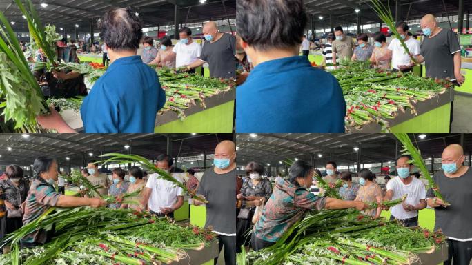 中国传统端午节市场买卖艾草菖蒲挂门口防虫