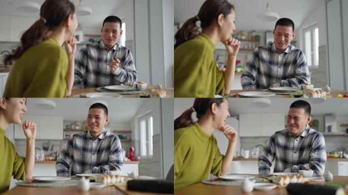 一对年轻的日本夫妇在午餐时玩得很开心