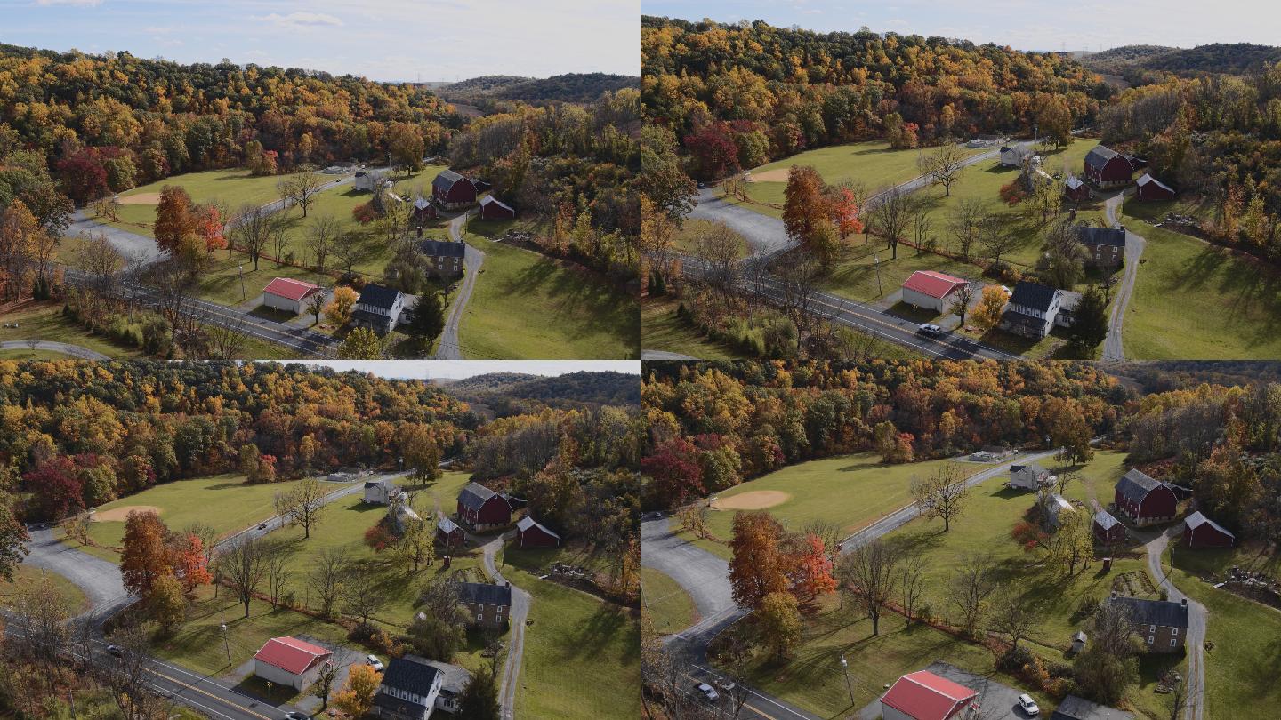 宾夕法尼亚州乡村多彩的秋天。鸟瞰Lehigh镇附近的小村庄，在森林覆盖的群山之间。具有向前和向下倾斜