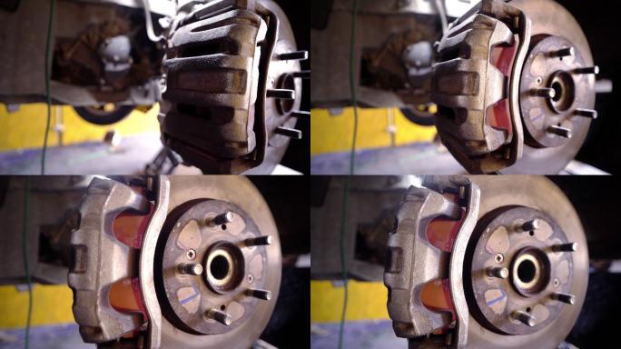 汽车修理厂车轮制动系统的特写镜头。