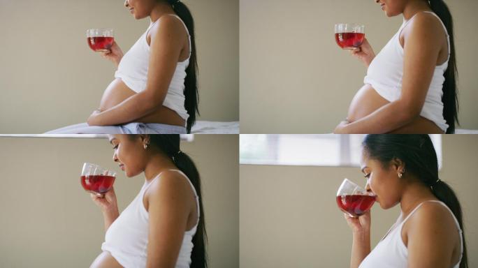 一名孕妇在家喝茶的4k视频片段