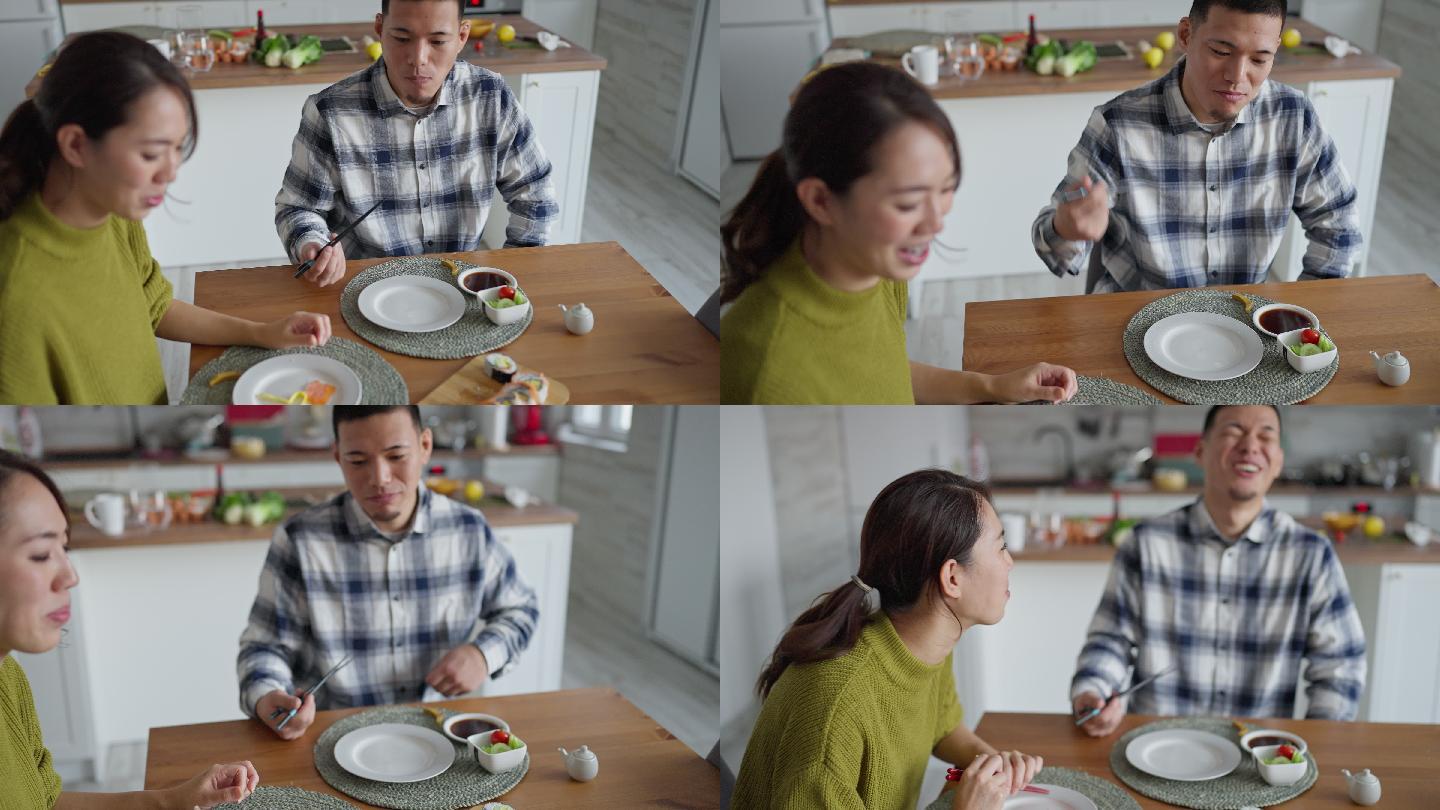 宁静的日本年轻夫妇，午餐吃寿司卷