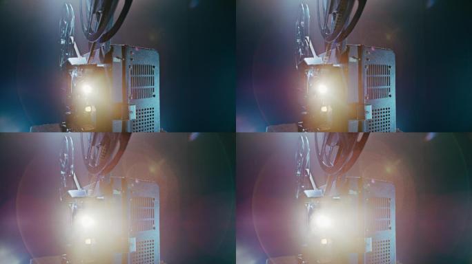 LD电影放映机显示电影，光线从镜头中射出