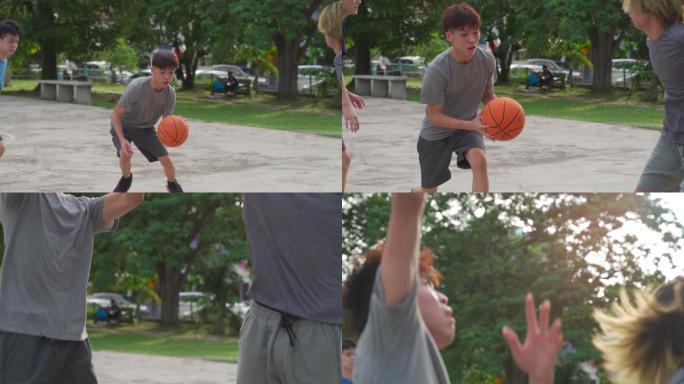 慢动作Z代亚裔中国少年在周末早上与朋友练习篮球比赛时挑战球员并投篮
