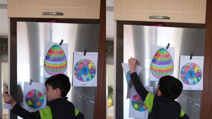 孩子在冰箱里贴照片
