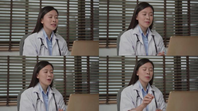 亚洲医生给患者打视频电话