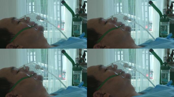 病人戴氧气面罩昏迷