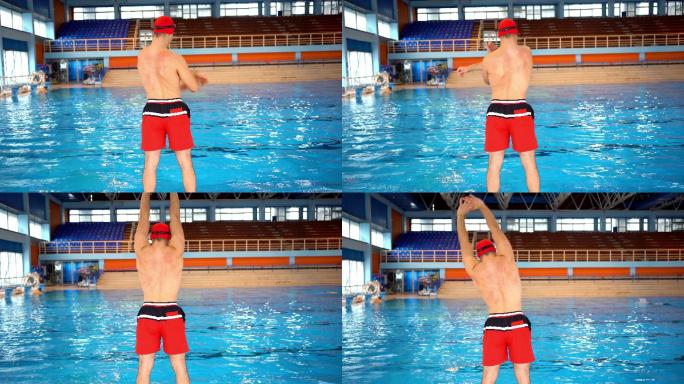 年轻男子在游泳池训练前伸展身体