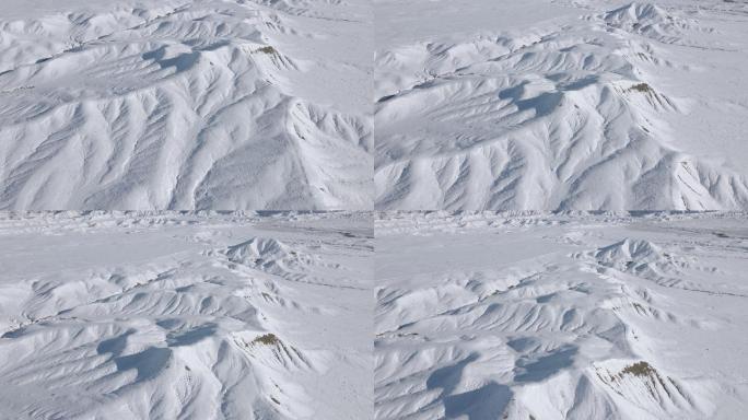 无人机POV拍摄美丽的科罗拉多沙漠冬季丘陵和山区的假山降雪极端天气视频系列