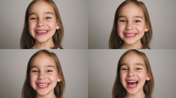 一个美丽的学龄前女孩微笑的肖像照