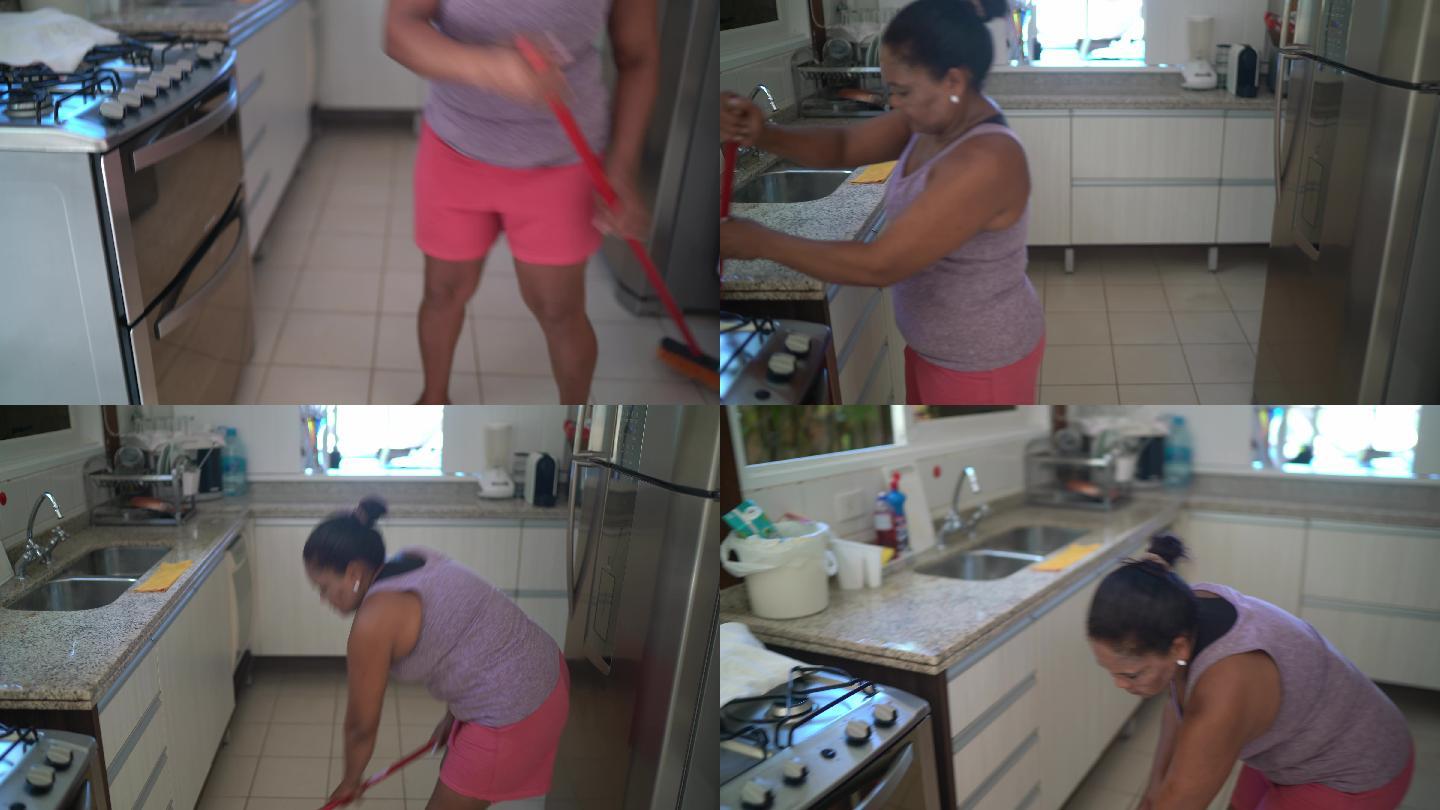 成熟女子在家扫地打扫拖地