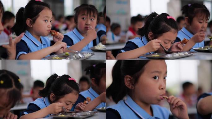 学校食堂学生吃饭小女孩吃饭