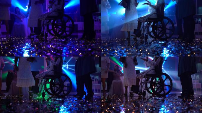 轮椅使用者在迪斯科舞厅跳舞