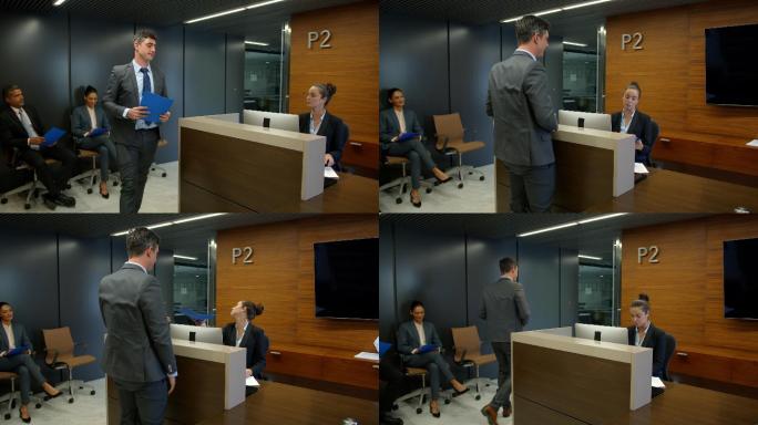 私人助理在将男性候选人送往公司办公室面试前检查其简历