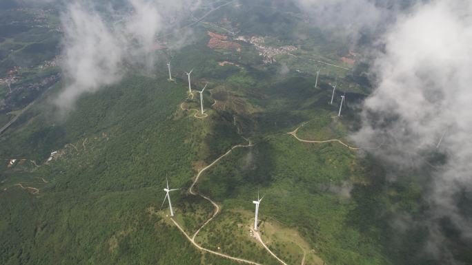 云层上高空航拍巨型风力发电机群