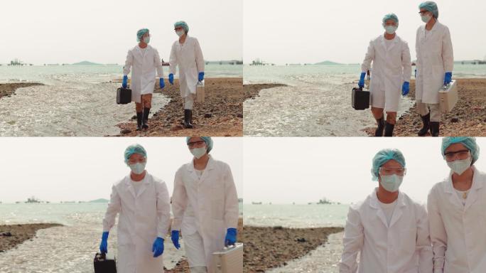 两位生态学家在污染区检查污染水