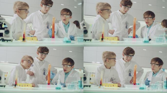 孩子们进行科学实验。实验室内部，混合泡沫、搅动液体