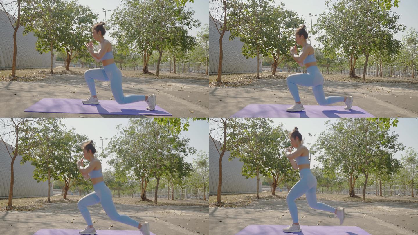 亚洲女性健康她在户外锻炼，做弓箭步姿势。