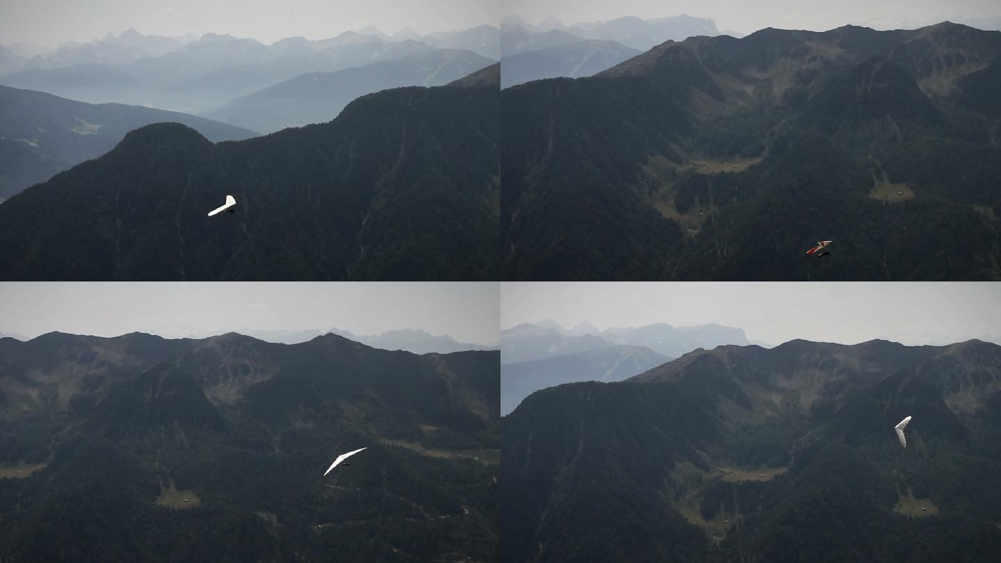 在阿尔卑斯山上空悬挂滑翔机