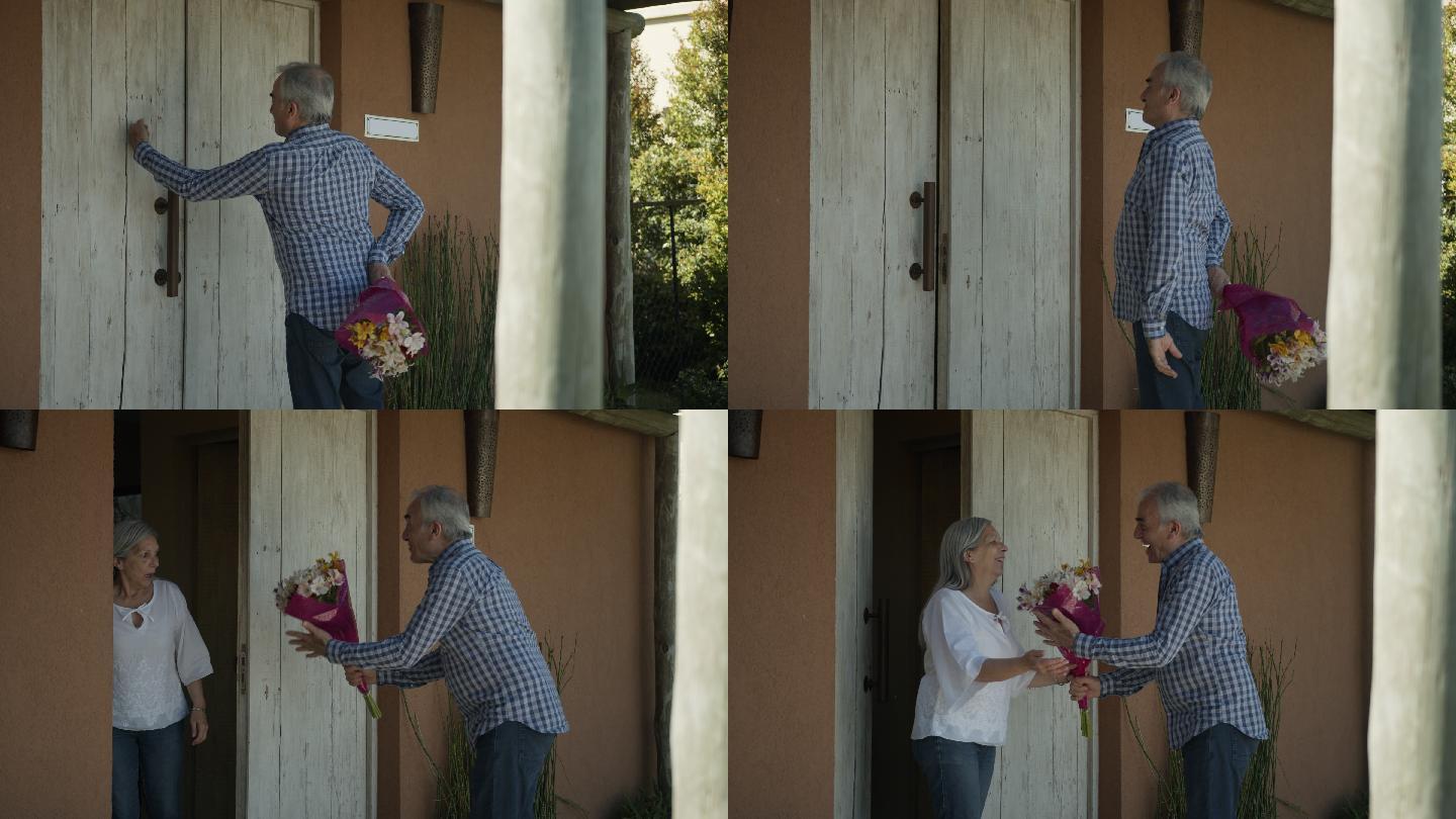 爱的资深男士用花束给家里的女性资深伴侣惊喜