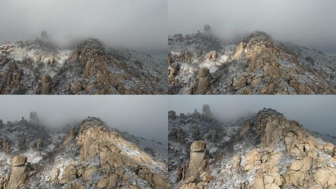 航拍云雾中崂山雪景