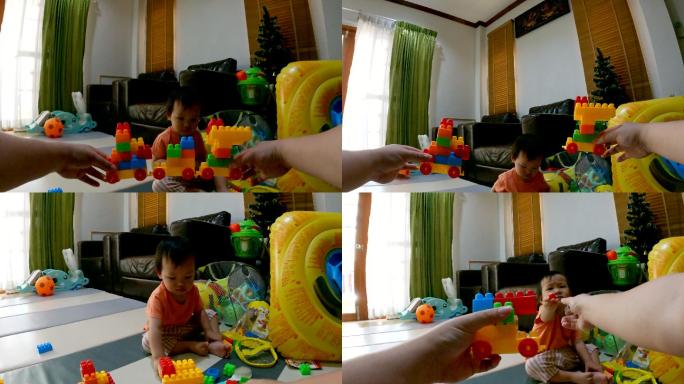 POV：爸爸和孩子玩塑料砖