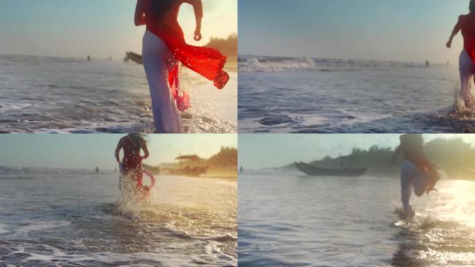 海边日出女生向海浪奔跑升格背影