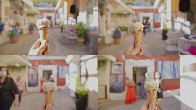 波西塔诺（Positano）的SLO MO POV游客带着冰淇淋筒穿过小巷