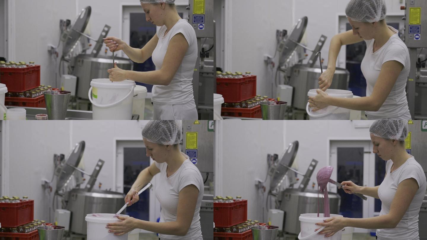 女工人在酸奶中添加纯水果