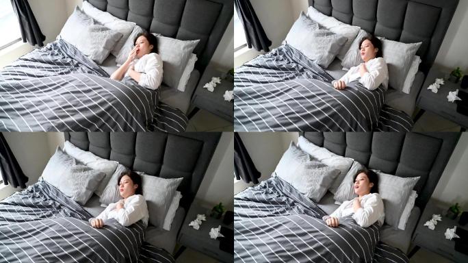 感染流感病毒的亚洲女士在家卧床