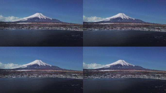 4K UHD鸟瞰无人机在蓝天上拍摄了富士山和山中湖的积雪
