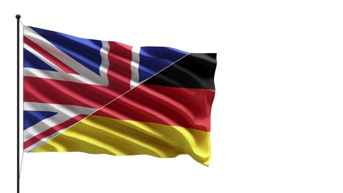 4k英国和德国国旗在桅杆上迎风飘扬的概念