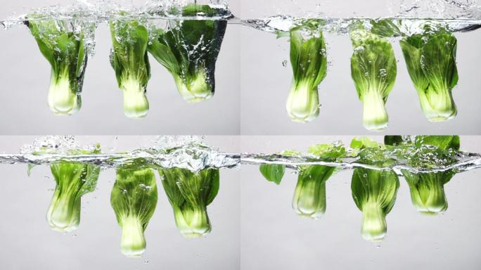 超慢镜头：白底白白菜掉进淡水中