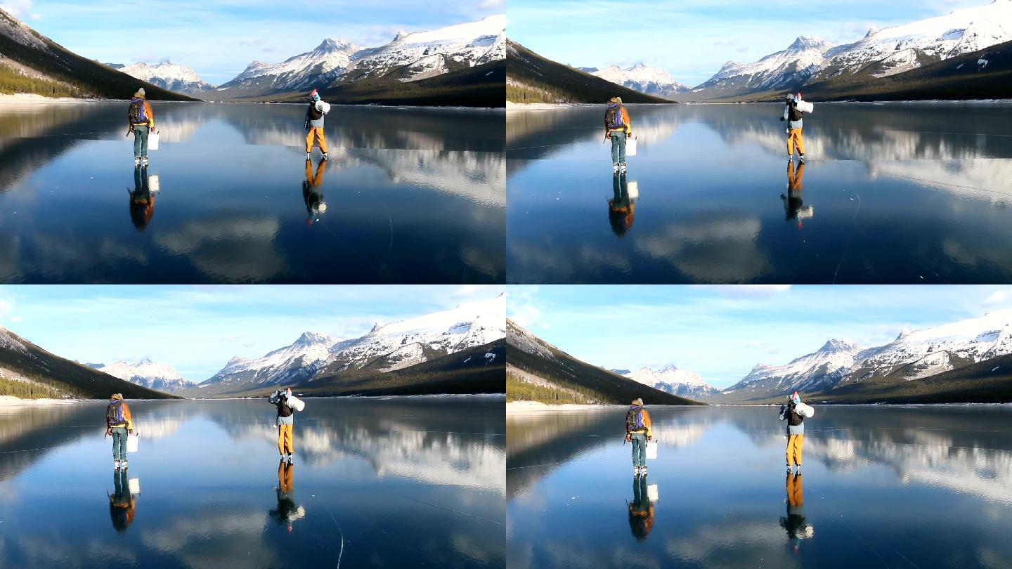朋友们沿着结冰的阿尔卑斯湖滑冰，钓到冰鱼